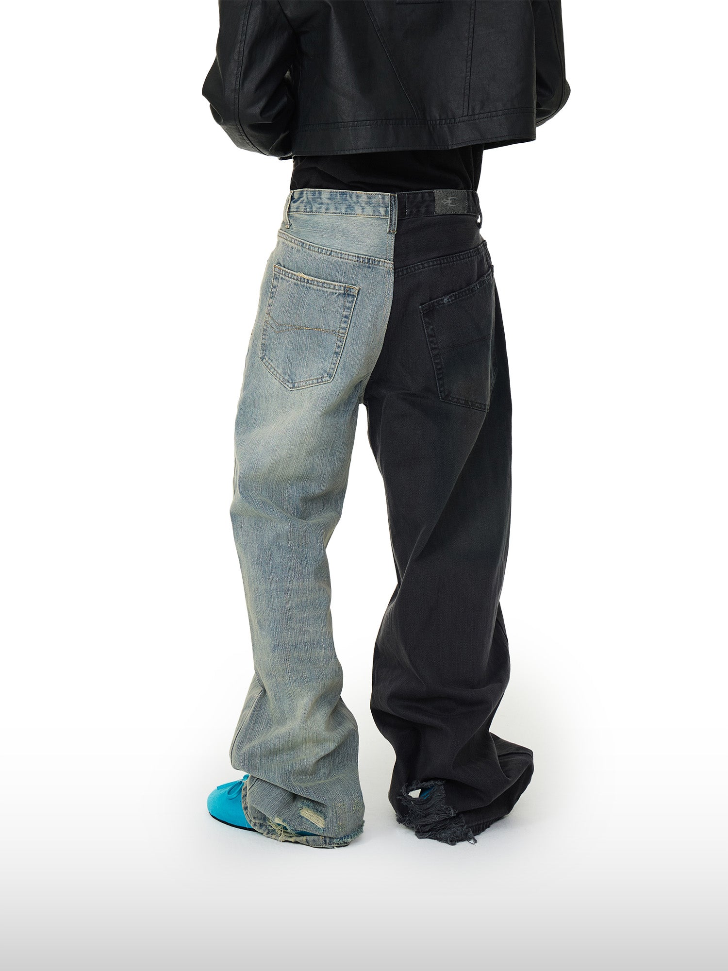 Jeans con rottura binaria