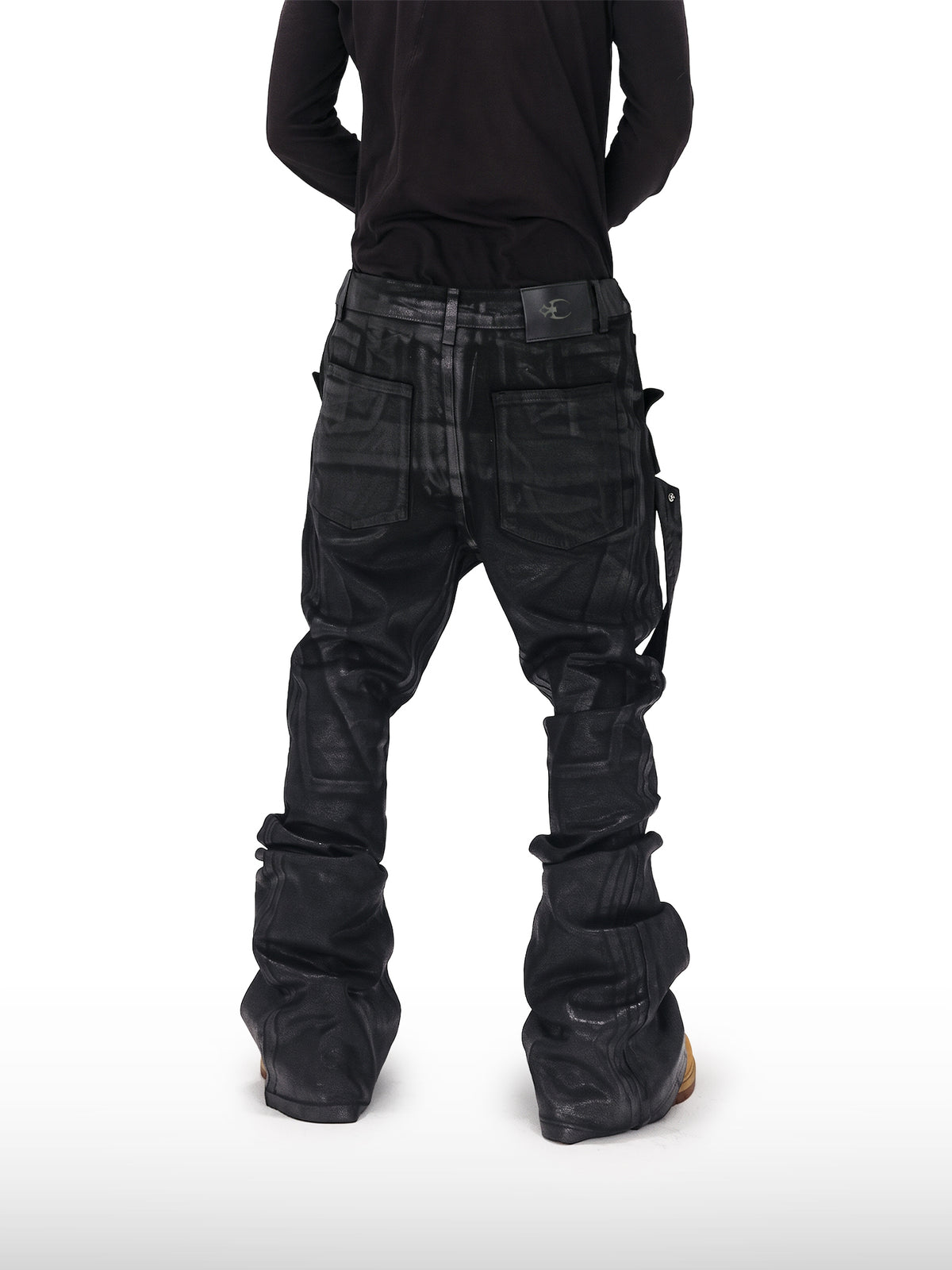 Jeans svasati rivestiti con cinturino