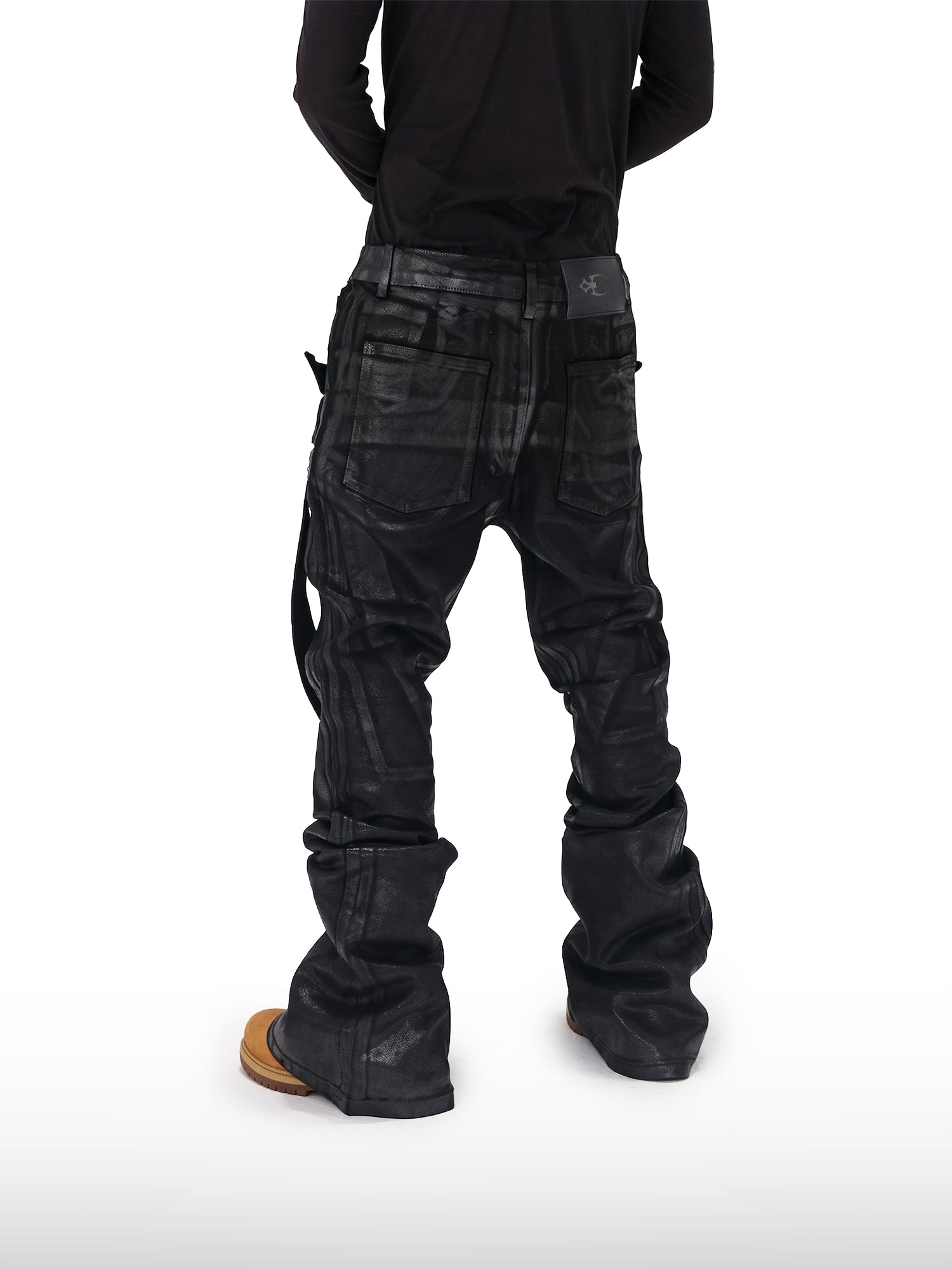 Jeans svasati rivestiti con cinturino
