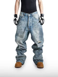 Jeans ampi effetto schizzi di vernice