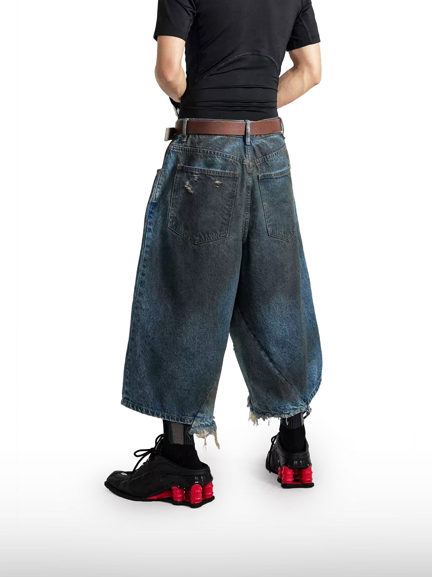 Shorts in denim distressed a gamba larga