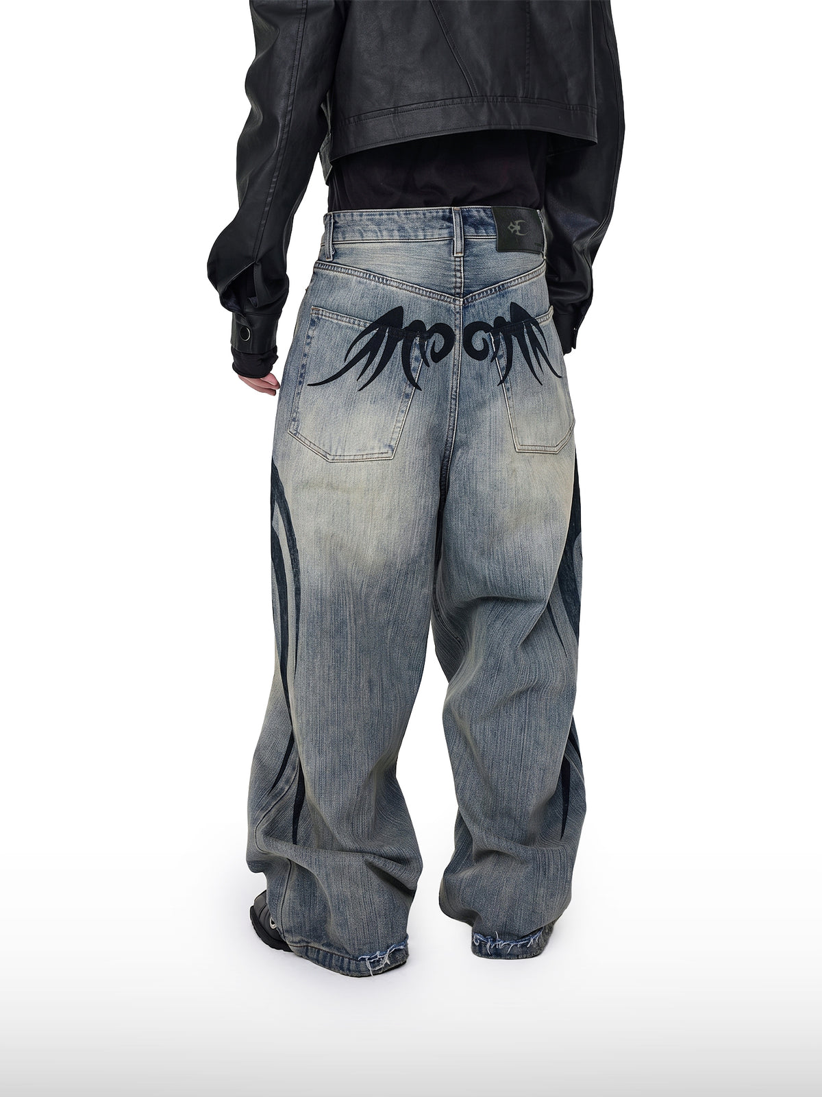 Jeans tribali sbiaditi