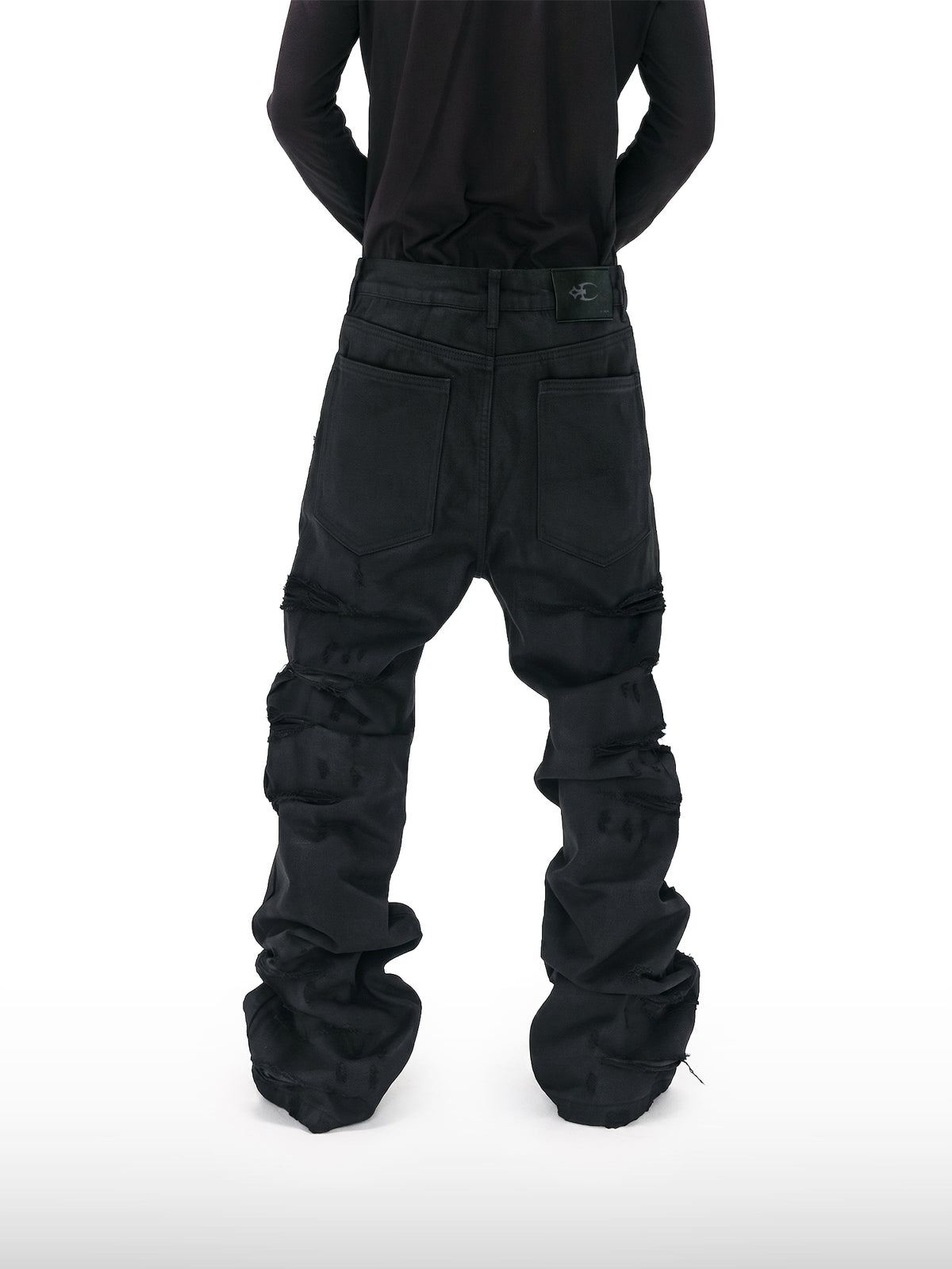 Jeans Svasati Cerati con Strappi