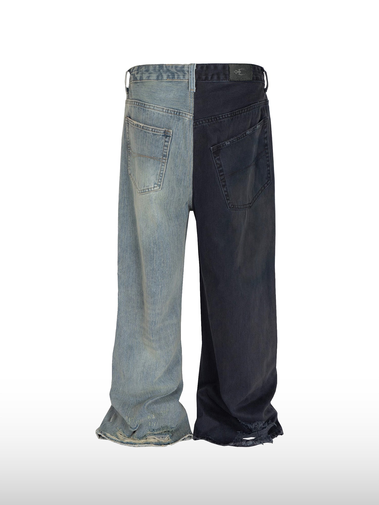 Jeans con rottura binaria