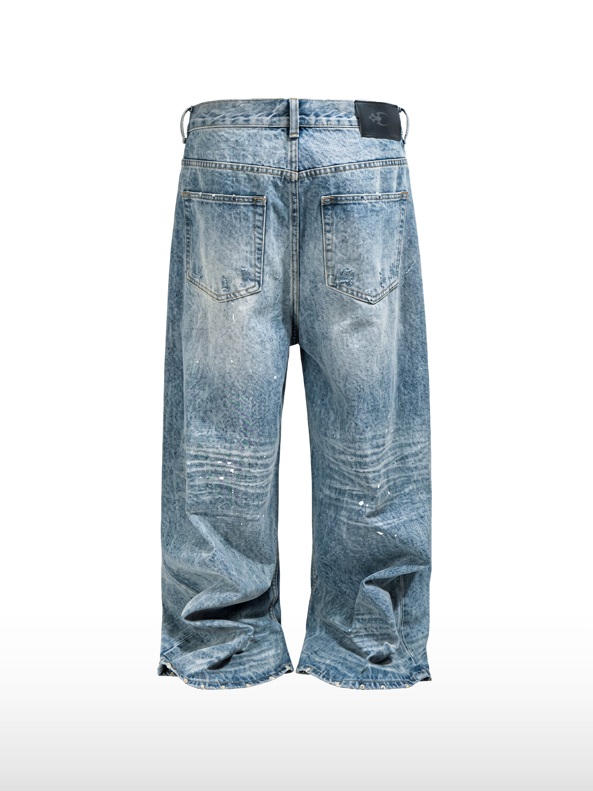 Jeans ampi effetto schizzi di vernice