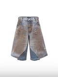 Shorts in denim distressed a gamba larga