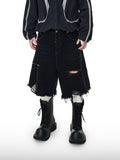 Pantaloncini strappati