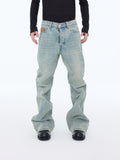 Jeans larghi impilati