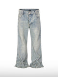 Jeans larghi impilati